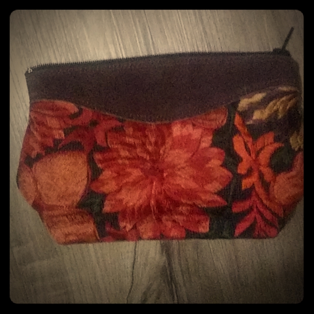 Beautiful hand stiched flower and leather bag